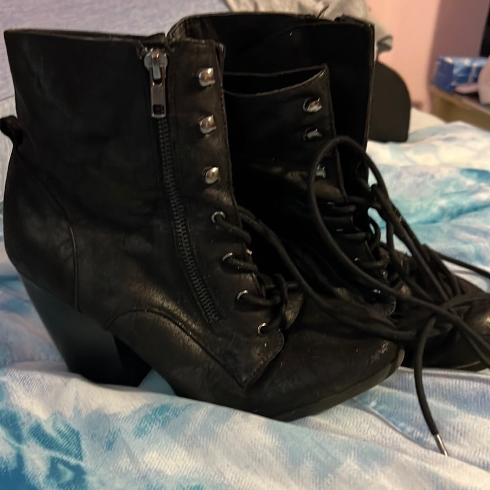 Lace up black boots with heals